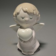 Descrizione Prodotto: Angelo Pregante 8x6x10,5 cm. in porcellana lucida bianco e rosa