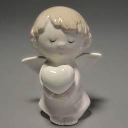 Descrizione Prodotto: Angelo Pregante 8x6x10,5 cm. in porcellana lucida bianco e rosa