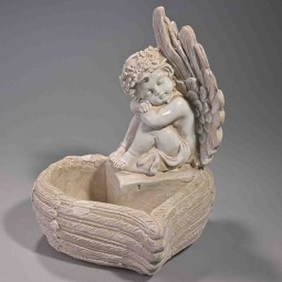 Vaso a cuore con angelo 23x23x30 in cemento color crema